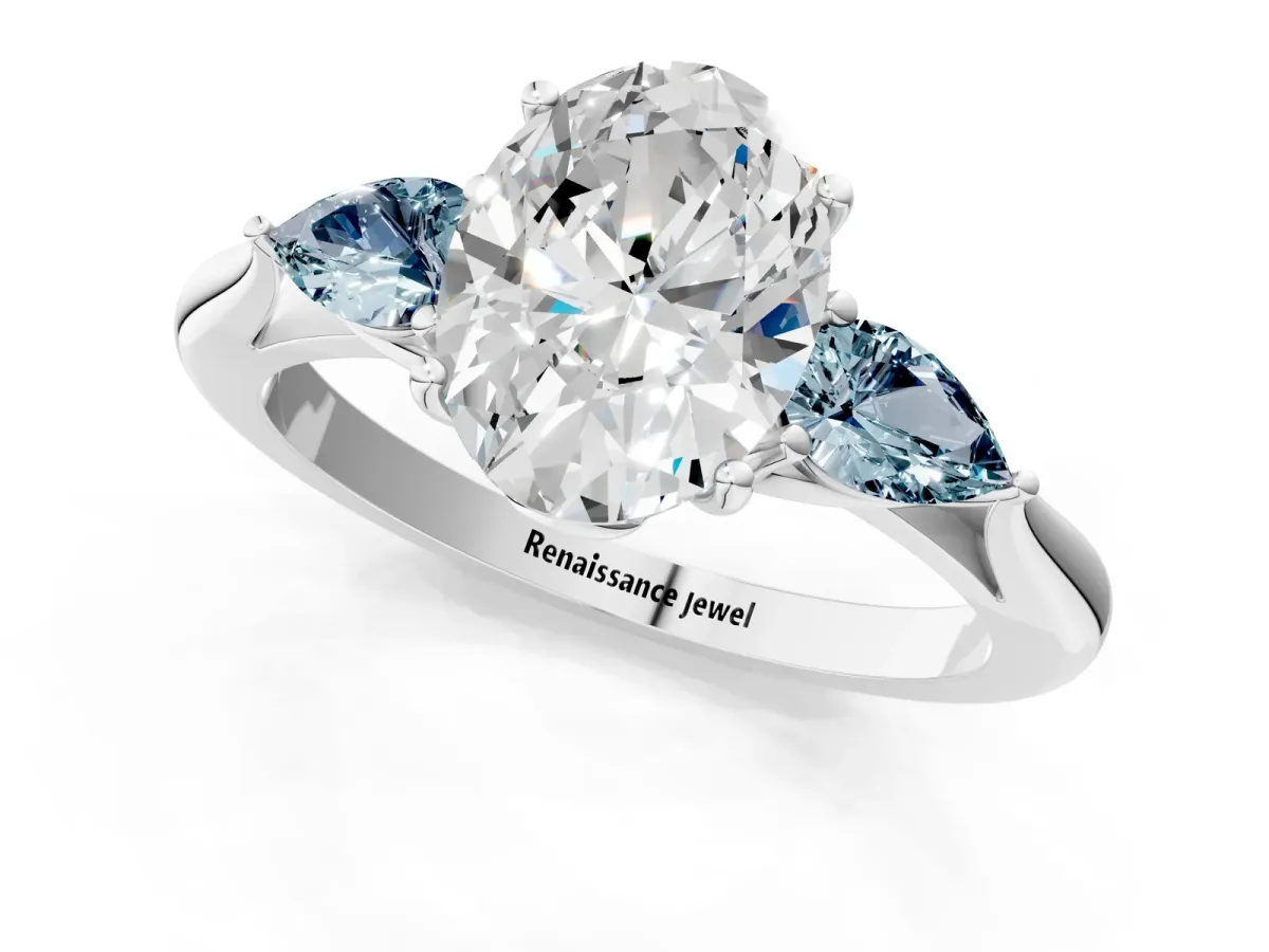 Oval Cut Diamond Three-Stone Ring with Pear Aquamarine Side Stones and Prong Setting White gold