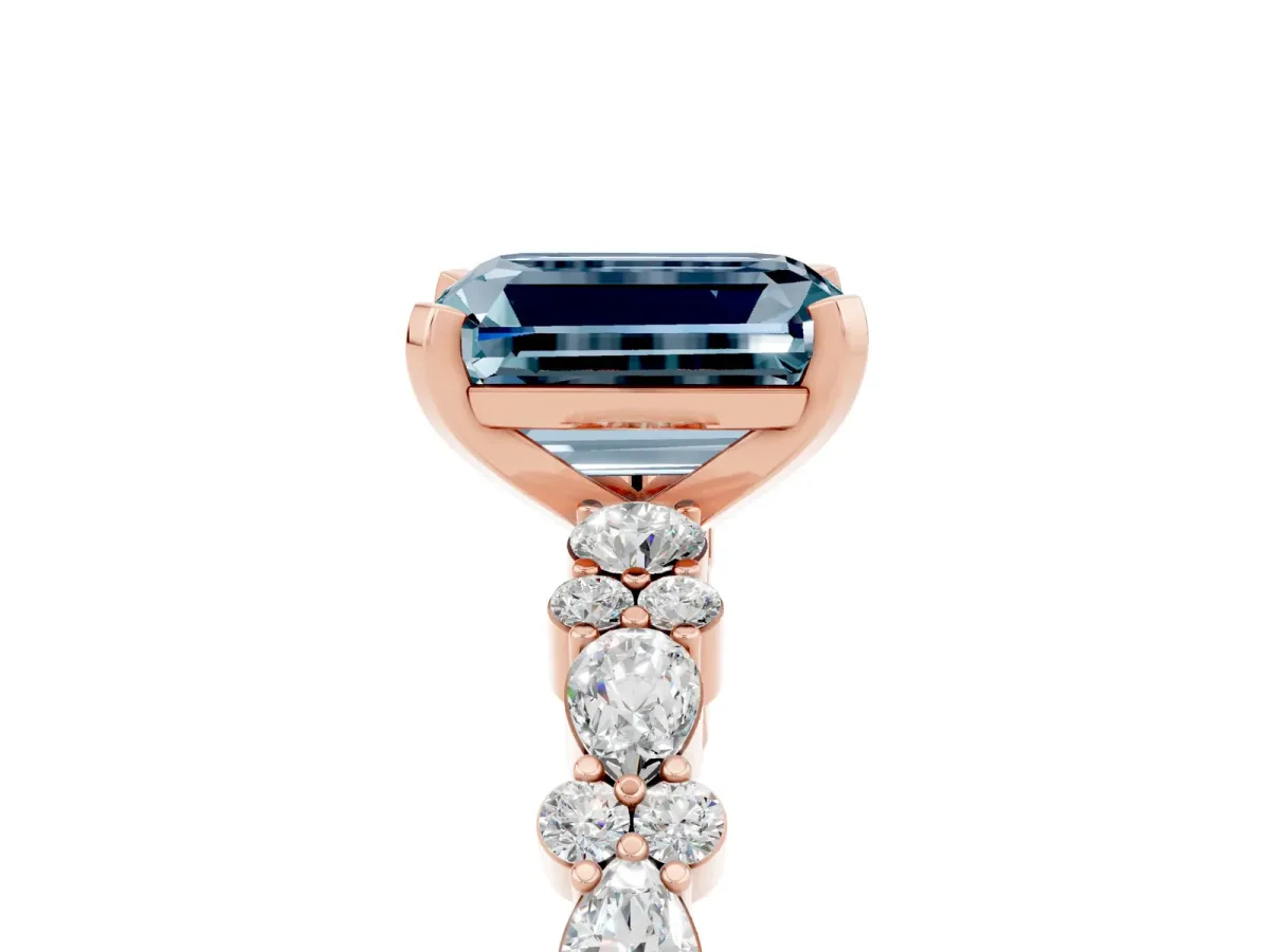 Emerald Cut Aquamarine Side Stone Solitaire Ring with Round and Four-Prong Setting Rose gold