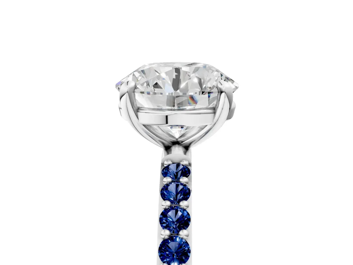 Round Cut Diamond Solitaire Ring with Round Blue Sapphire Pavé Band and Prong Setting Silver