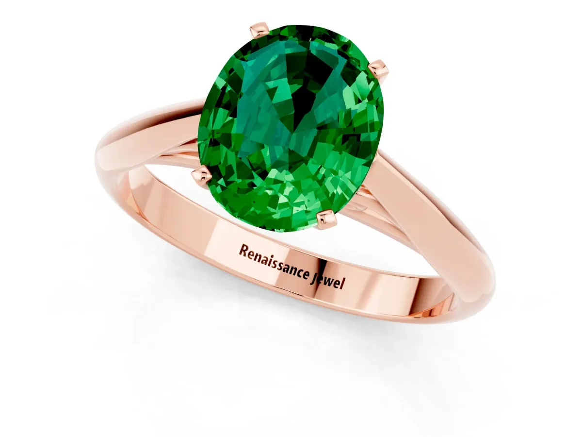 Oval Cut Emerald Solitaire Engagement Ring with Cathedral Setting and Four-Prong Mount Rose gold