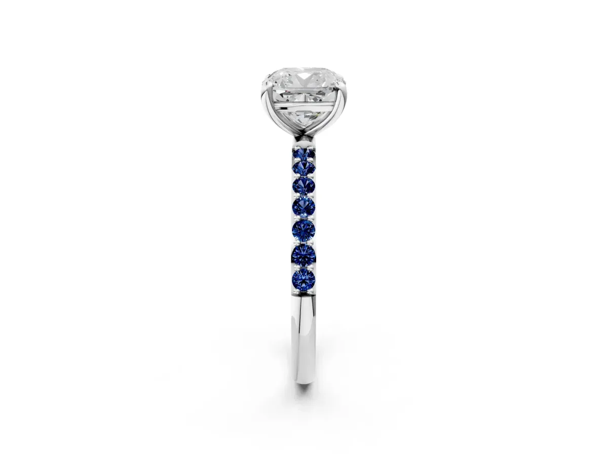 Cushion Cut Diamond Solitaire Ring with Round Blue Sapphire Pavé Band and Prong Setting Silver