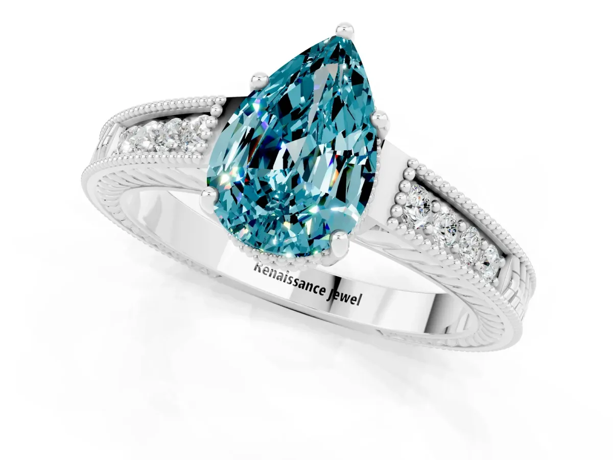 Pear Cut Blue Topaz Ring with Milgrain Pavé Band and Four-Prong Setting Platinum