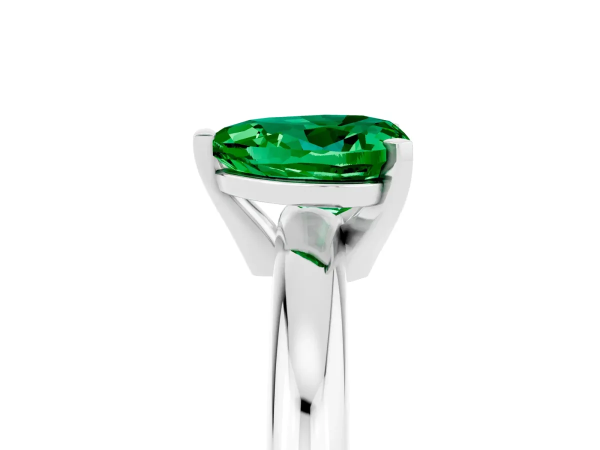 Heart Cut Emerald Solitaire Engagement Ring with Round Band and Four-Prong Setting Silver