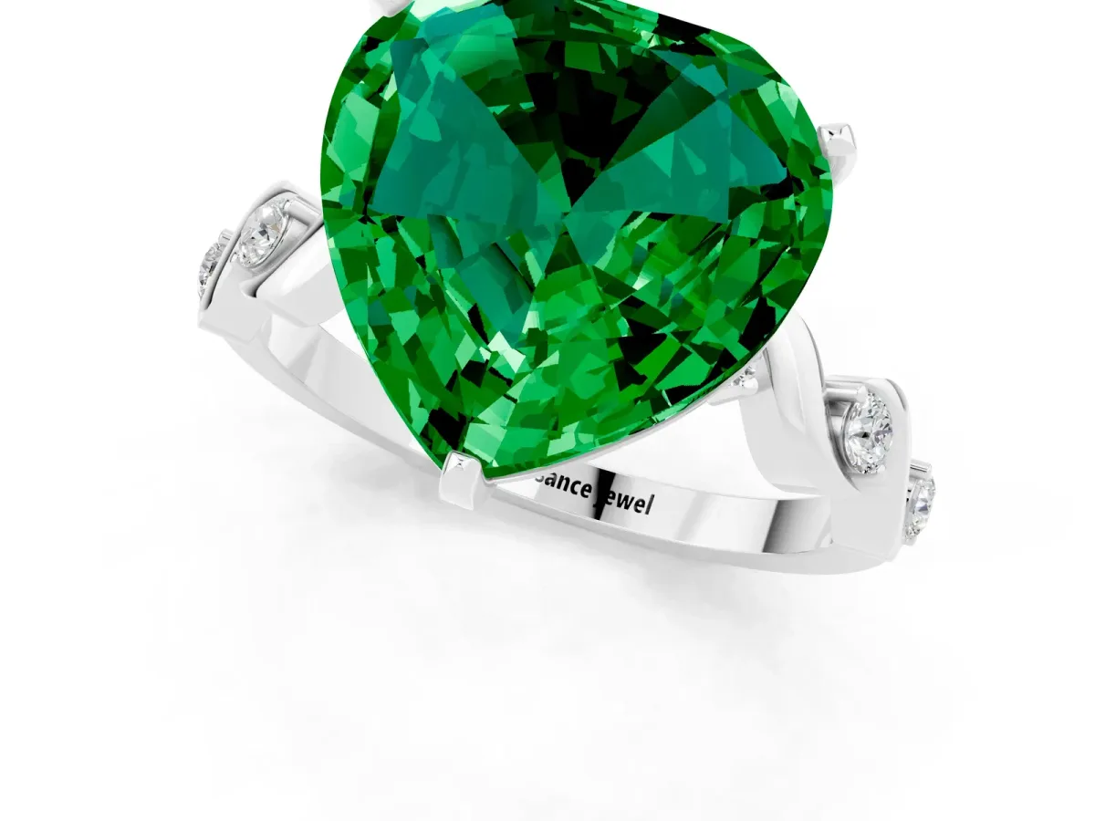 Heart Cut Emerald Solitaire Twisted Band with Round Accents and Prong Setting Silver