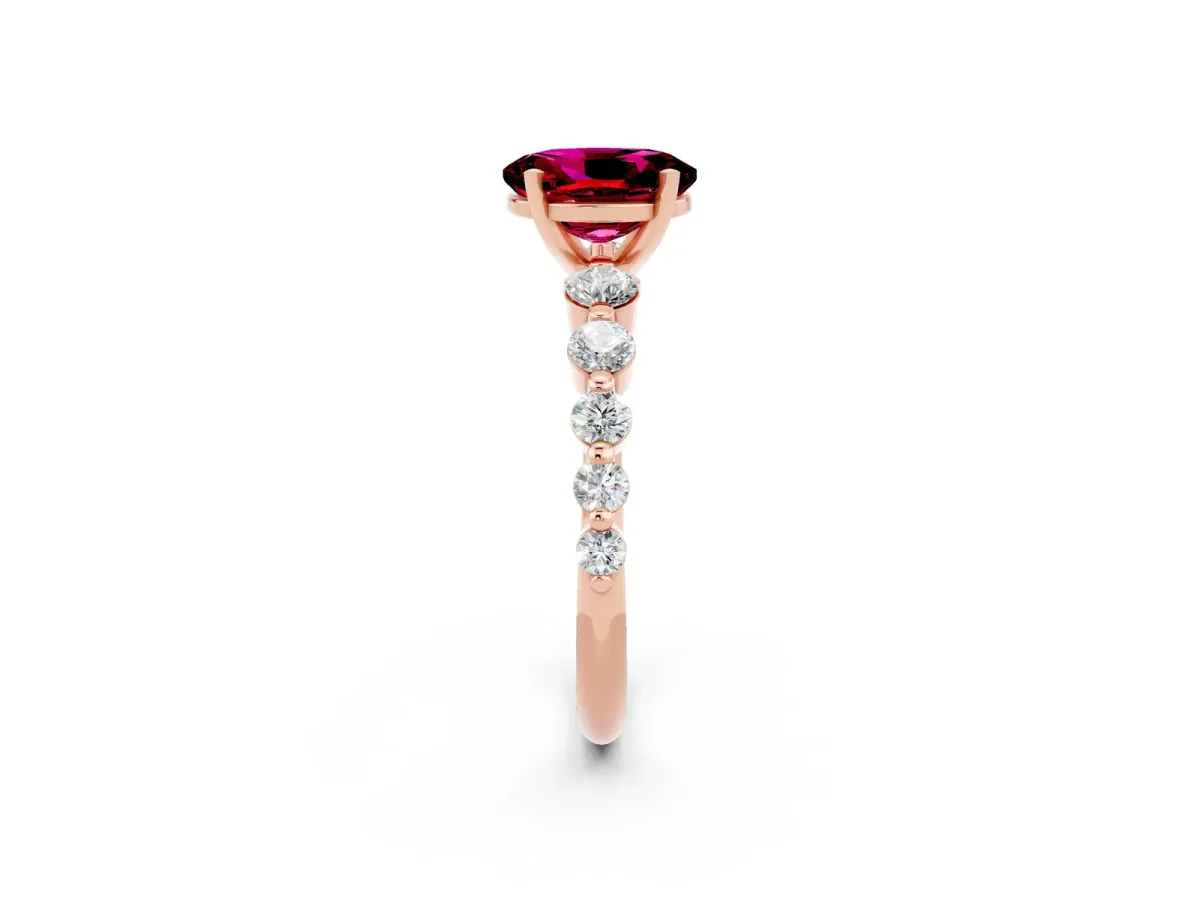 Oval Cut Solitaire Garnet Ring with Pave Band and Four-Prong Setting Rose gold