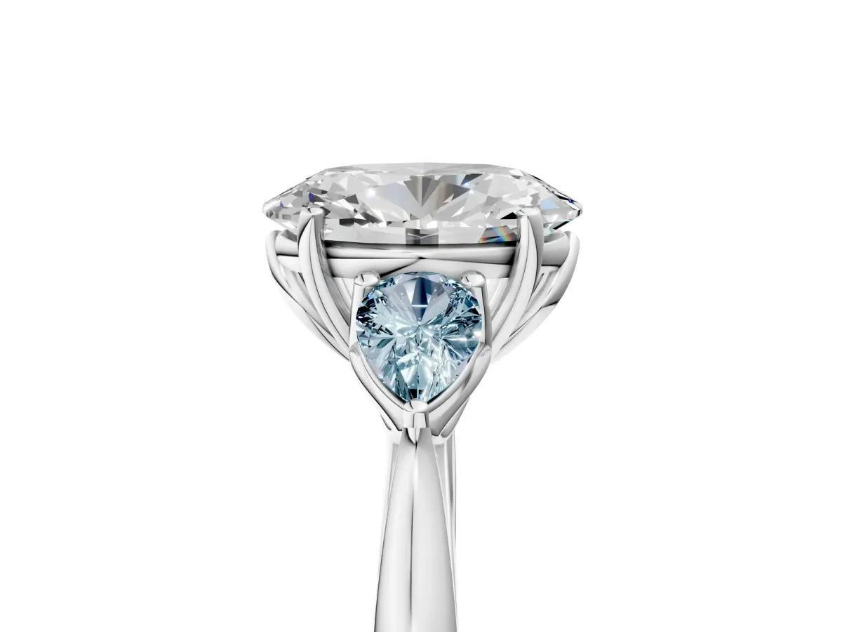 Oval Cut Diamond Three-Stone Ring with Pear Aquamarine Side Stones and Prong Setting White gold
