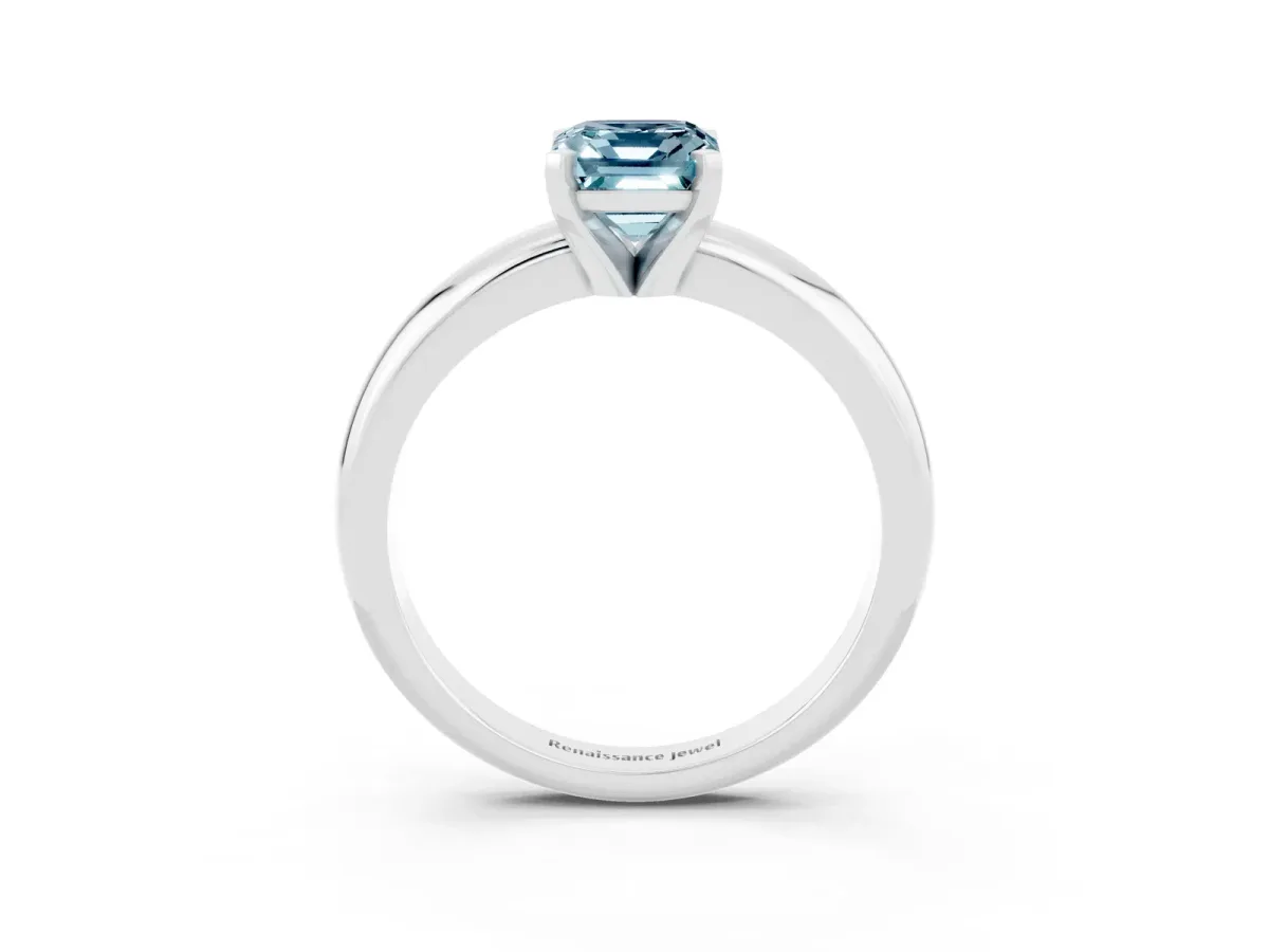 Emerald Cut Aquamarine Solitaire Engagement Ring with Round Band and Four-Prong Setting Silver