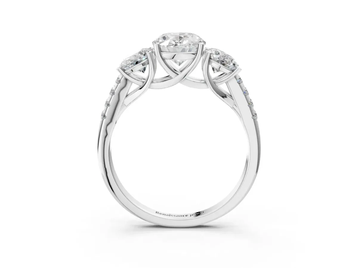 Three-Stone Oval Cut Diamond Ring with Round Pavé Band and Prong Setting Platinum