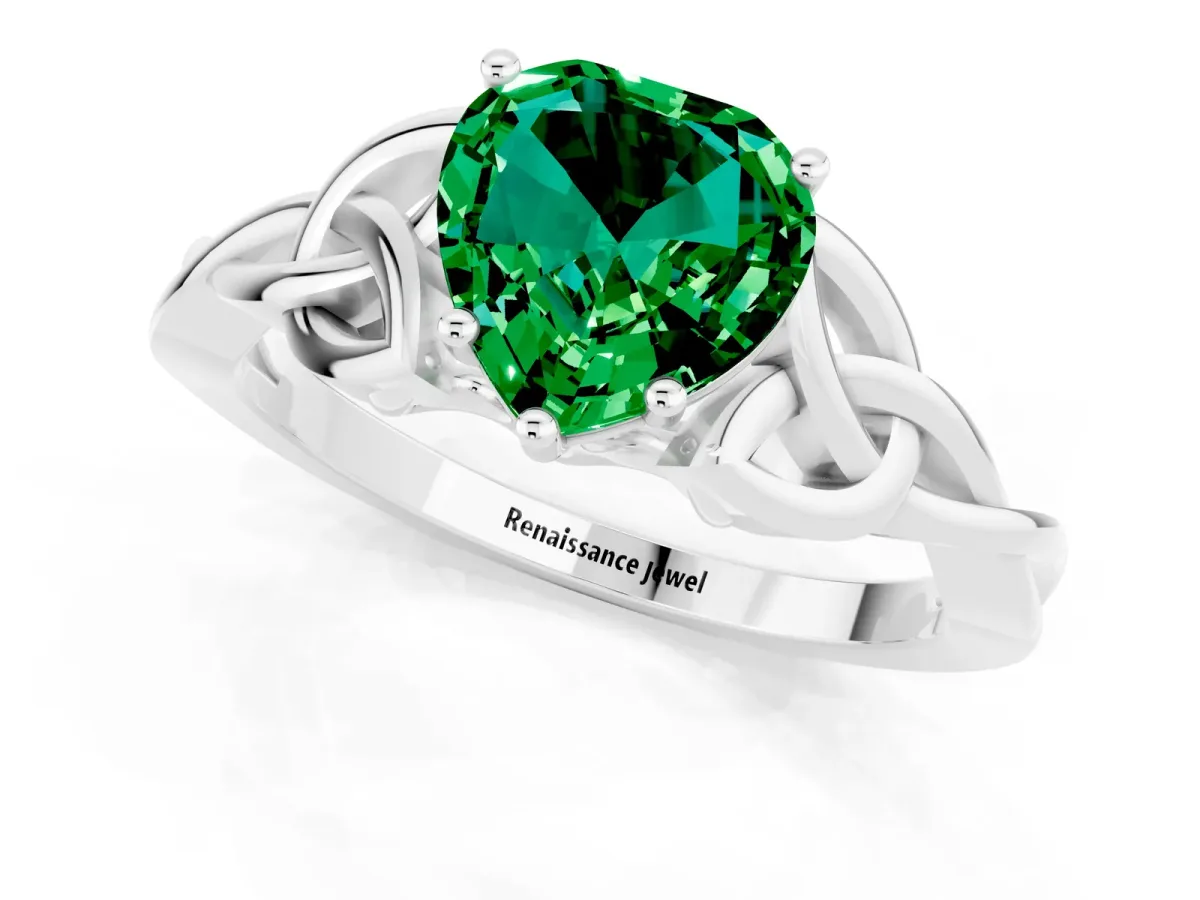 Heart Cut Emerald Solitaire Engagement Ring with Celtic Knot Band and Four-Prong Setting Silver