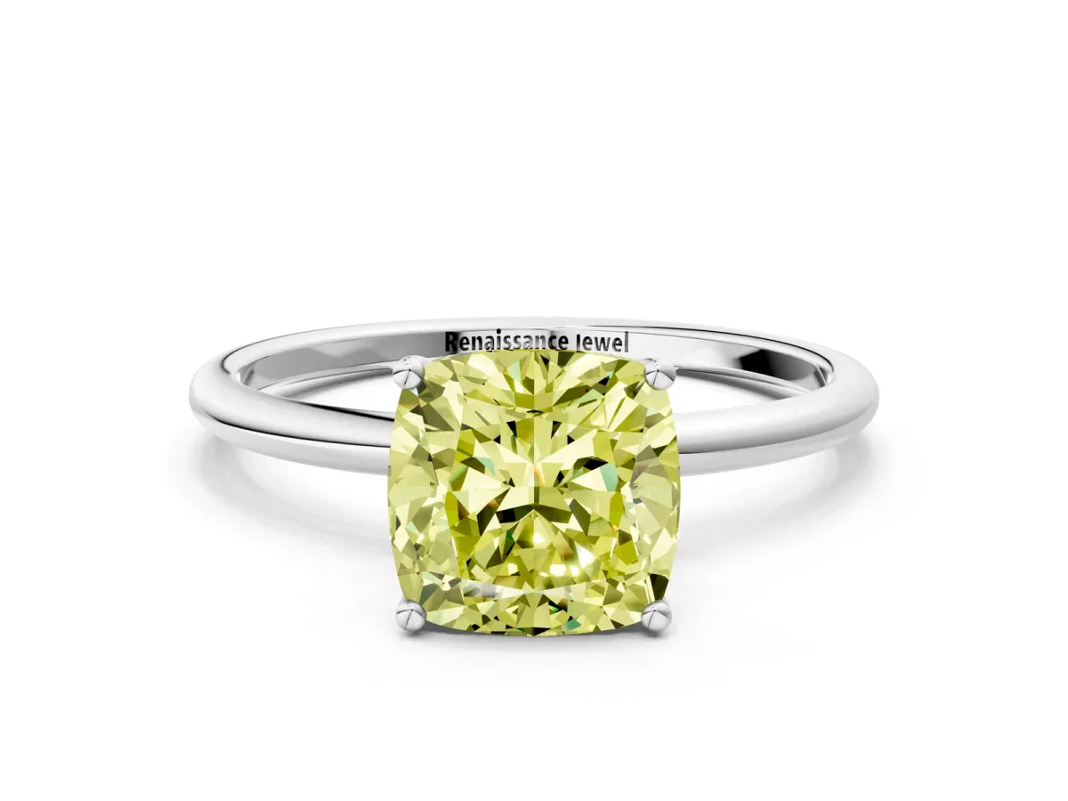 Fancy Yellow Cushion Cut Cut Solitaire Engagement Ring with Thin Band and Four-Prong Setting Silver