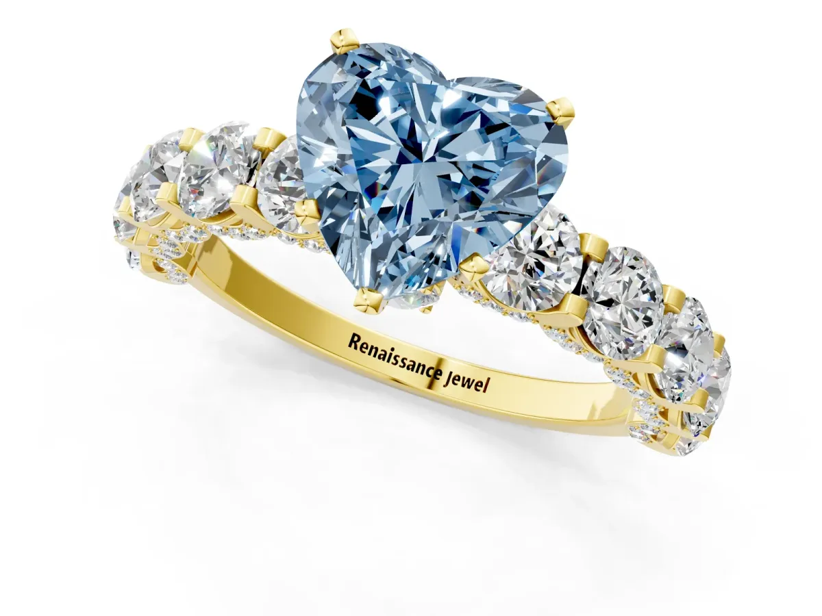 Fancy Blue Heart Cut Diamond Side Stone Engagement Ring with Four-Prong Setting Yellow gold