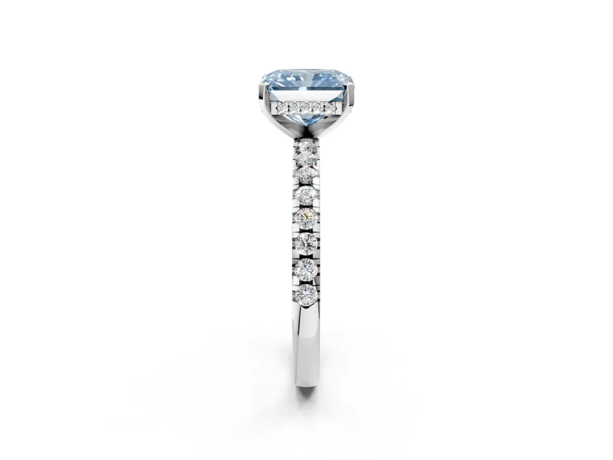 Fancy Blue Radiant Cut Diamond Solitaire Ring with Round Pavé Band and Four-Prong Setting Silver
