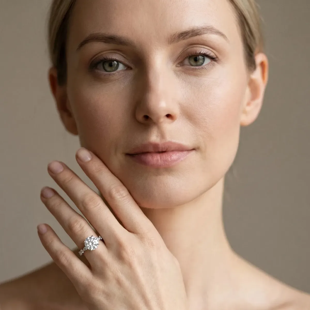 Round Cut Diamond Ring with Marquise and Round Side Stones and Four-Prong Setting Silver