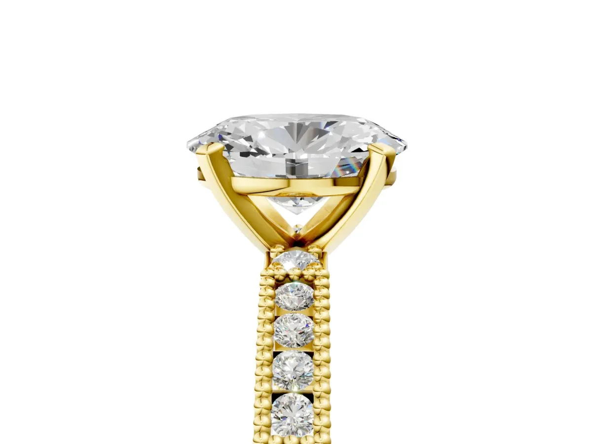 Oval Cut Solitaire with Pavé Band and Four-Prong Setting Yellow gold