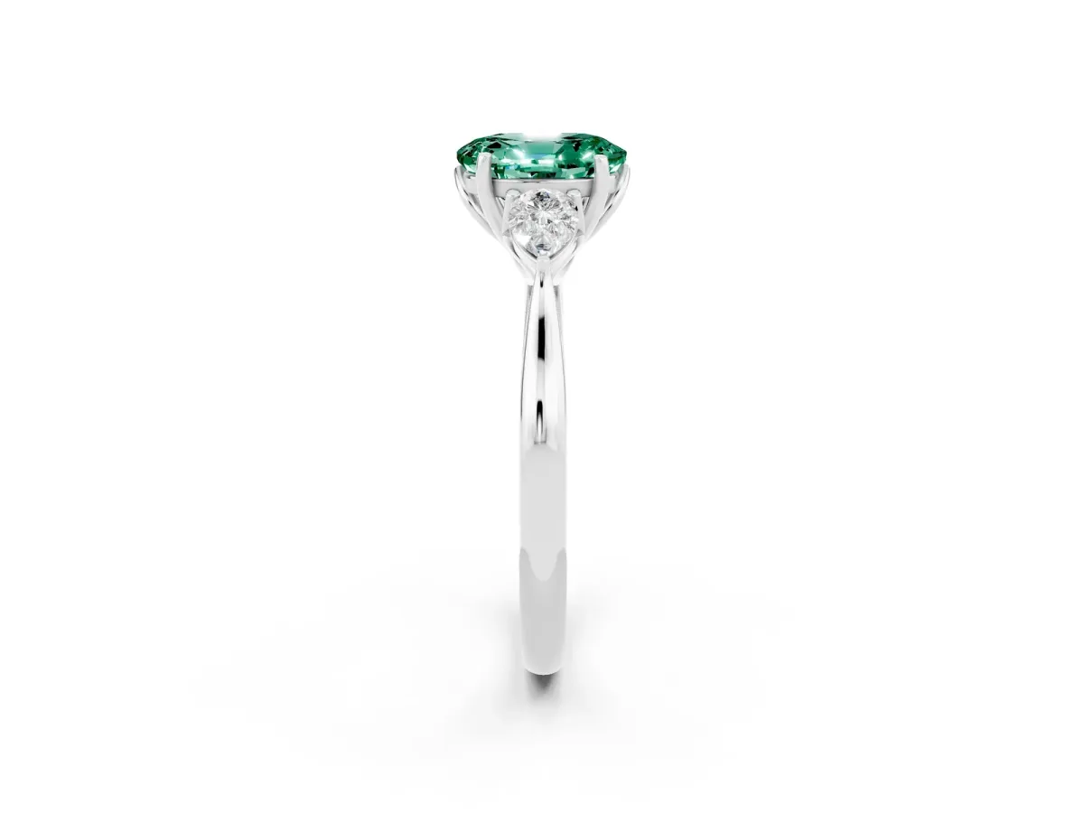 Three-Stone Oval Cut Green Sapphire Ring with Pear Side Stones in Four-Prong Setting White gold