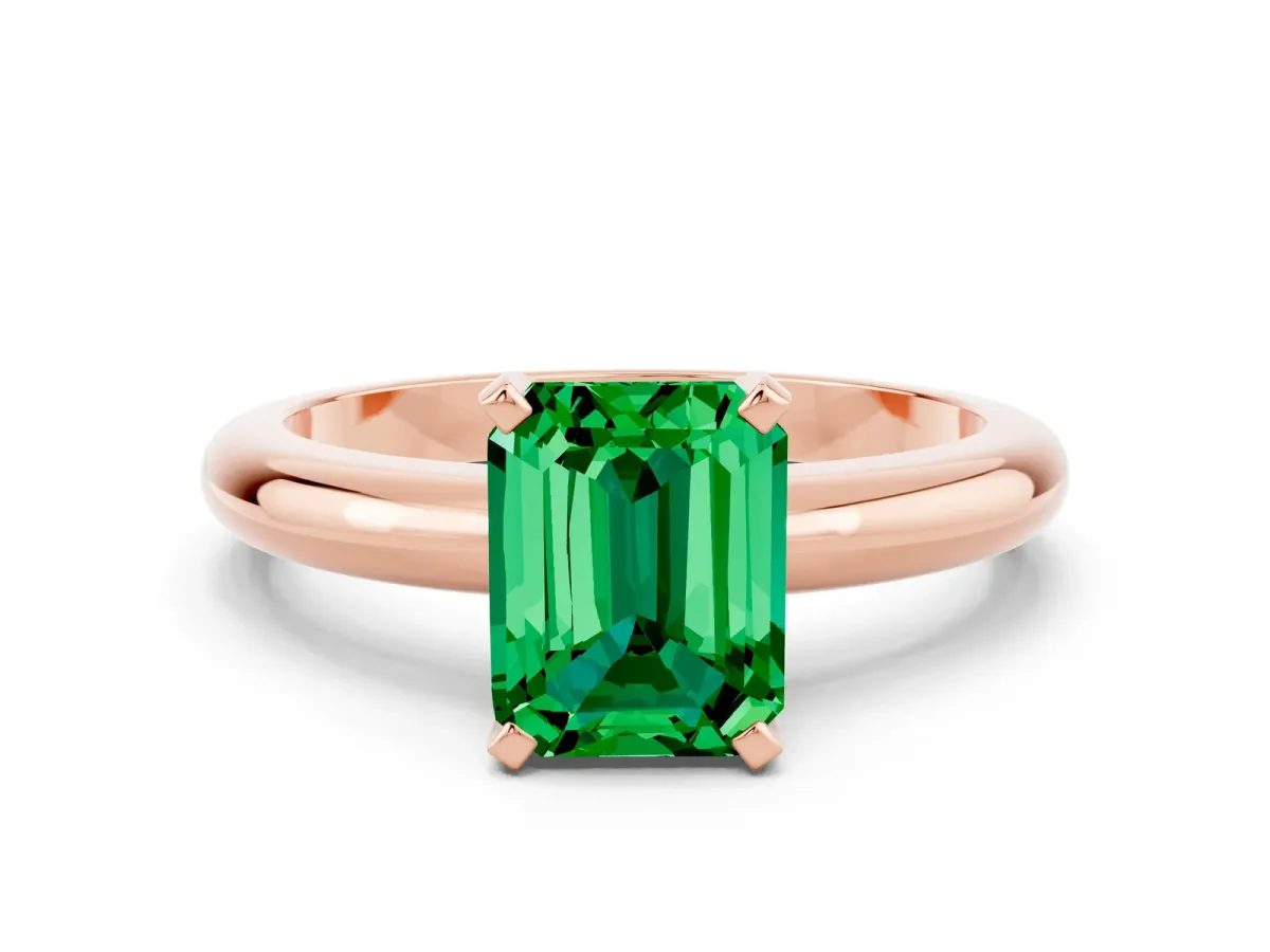 Emerald Cut Emerald Solitaire Engagement Ring with Round Band and Four-Prong Setting Rose gold