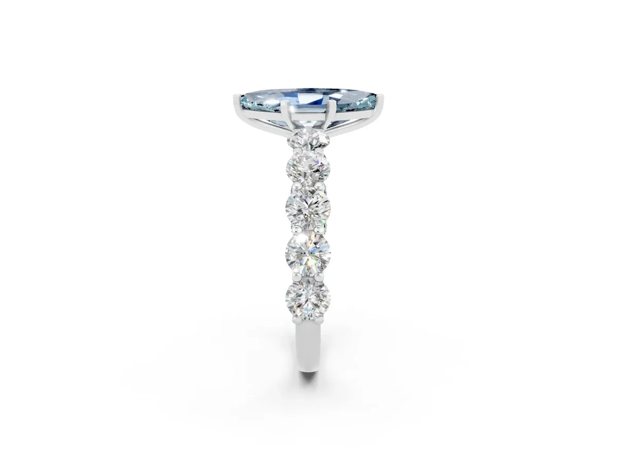 Marquise Cut Aquamarine Prong Setting with Side Stones on a Pave Band Silver