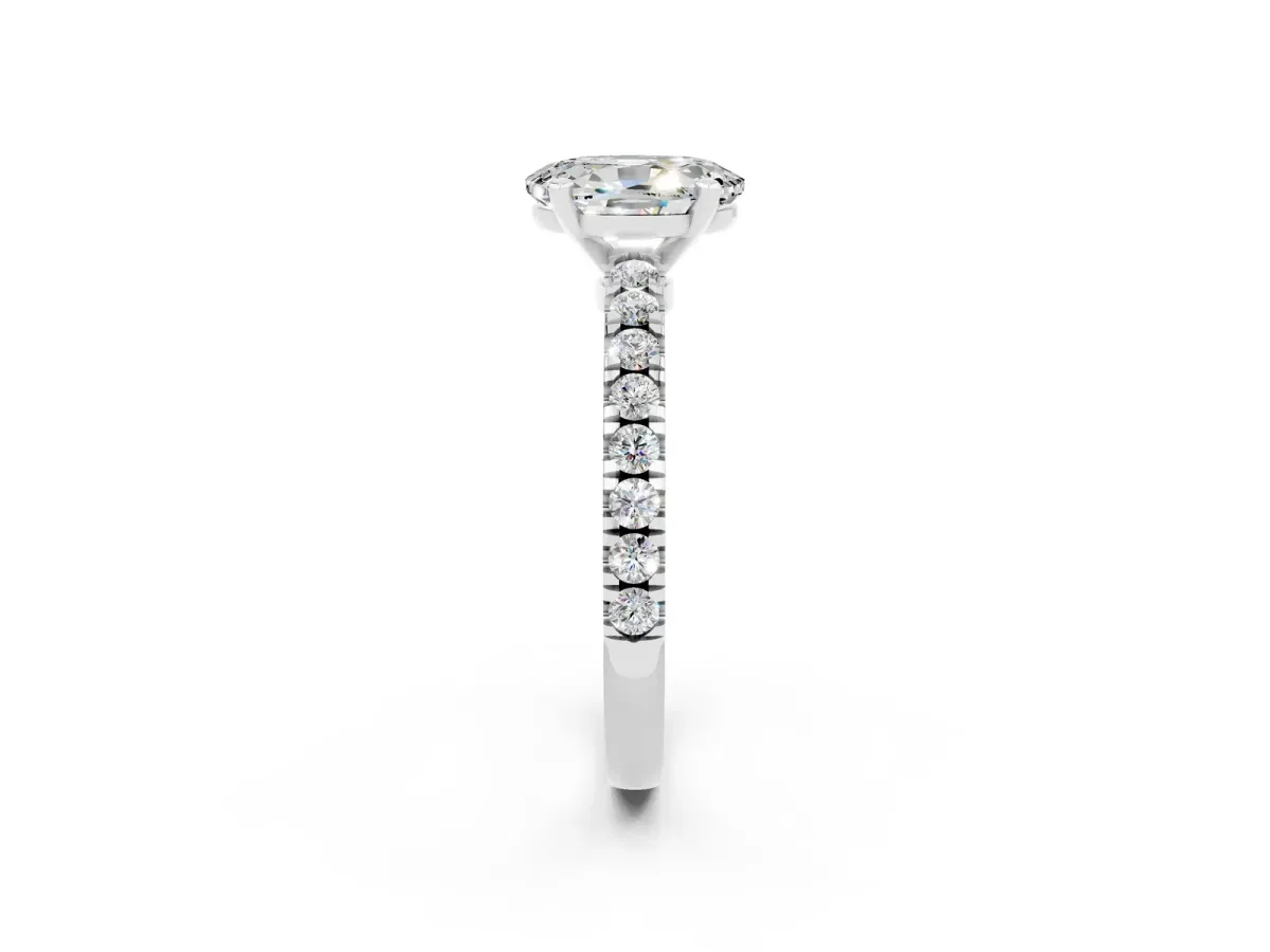 Oval Cut Solitaire Moissanite with Pavé Band and Four-Prong Setting Silver
