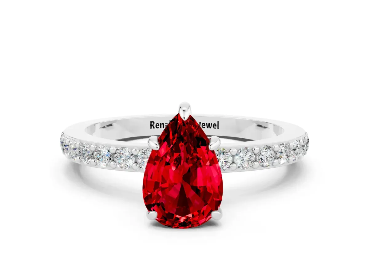 Pear Cut Ruby Solitaire Engagement Ring with Pavé Band and Four-Prong Setting Silver