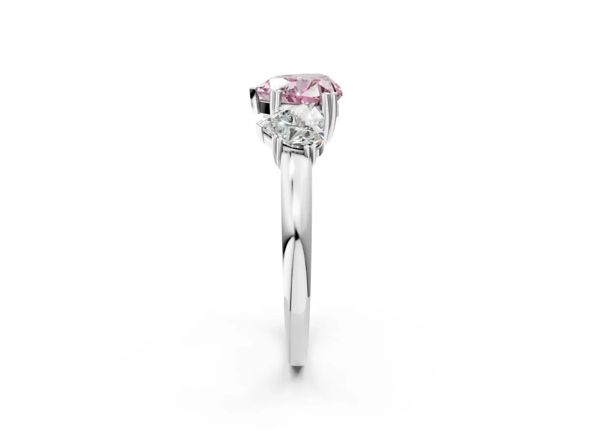 Fancy Pink Three-Stone Heart Cut Cut Diamond Ring with Channel Set Band and Four-Prong Setting Silver