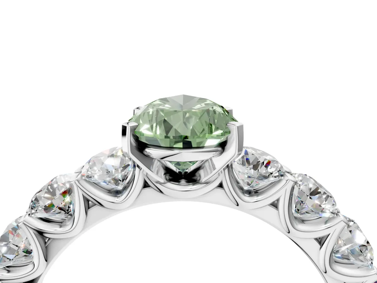 Fancy Green Pear Cut Diamond Prong Setting with Side Stones on a Pave Band Silver