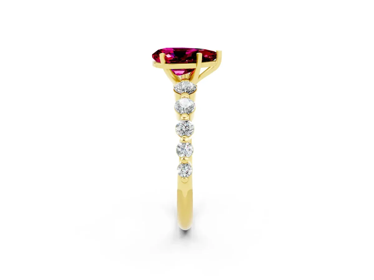 Pear Cut Solitaire Garnet Ring with Pave Band and Four-Prong Setting Yellow gold