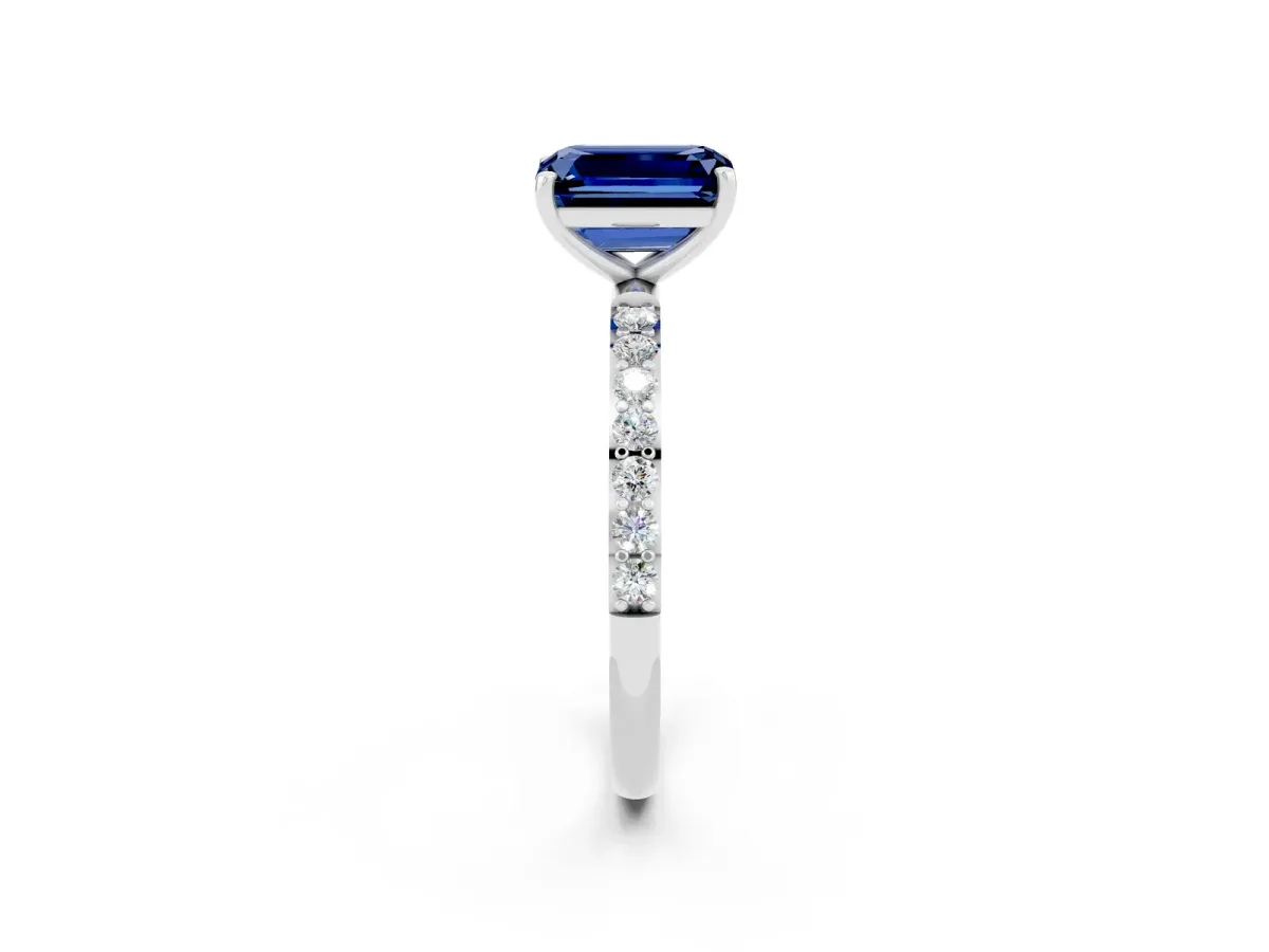 Emerald Cut Blue Sapphire Solitaire Ring with Round Pavé Band and Prong Setting Silver