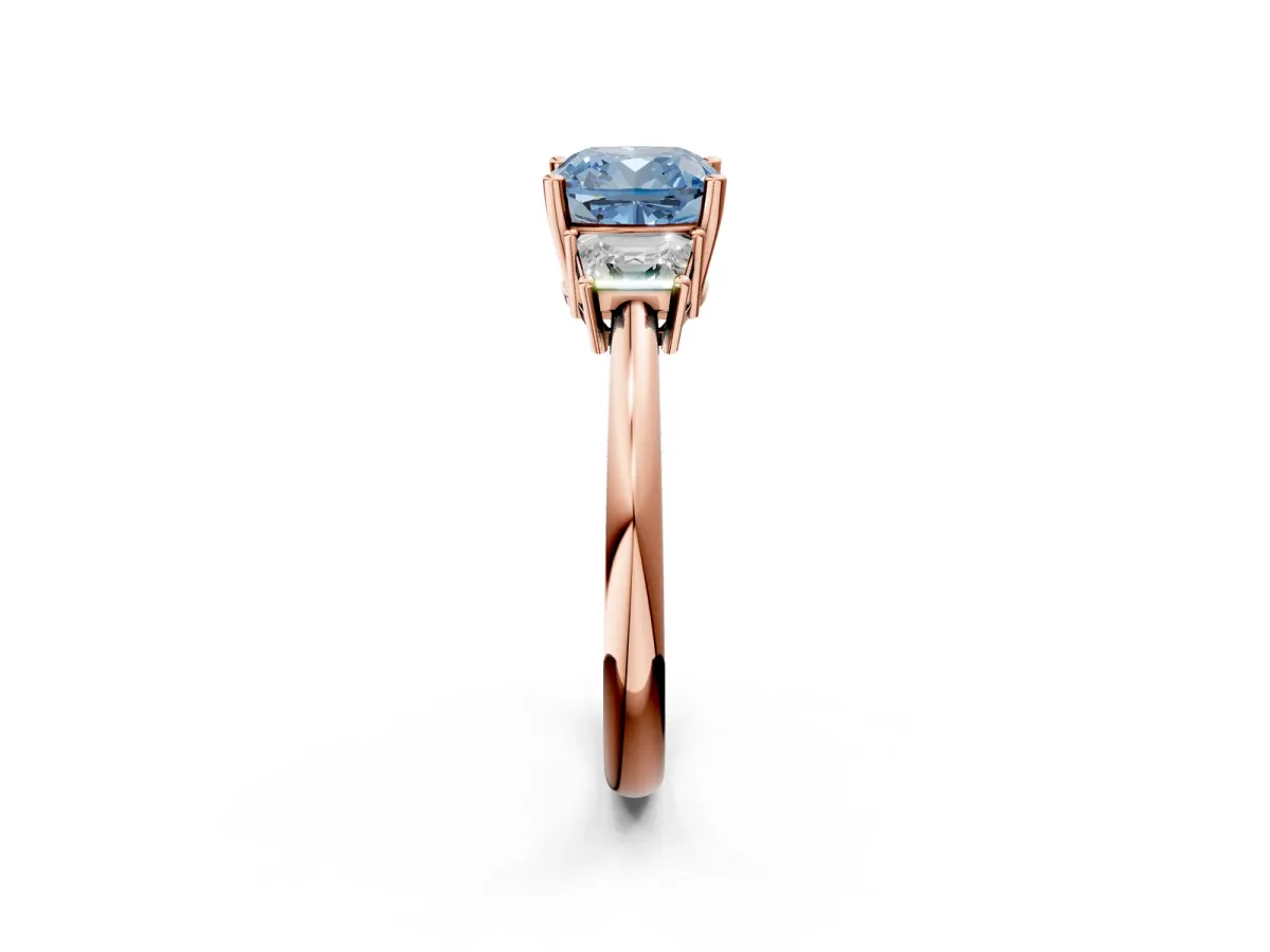Fancy Blue Cushion Cut Diamond Three-Stone Ring with Trapezoid Side Stones and Prong Setting Rose gold