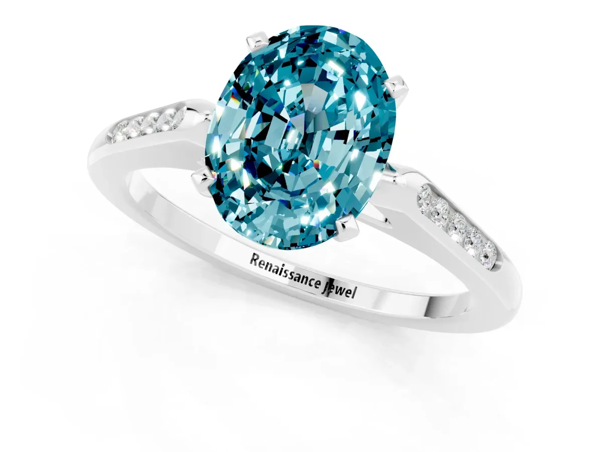 Oval Cut Blue Topaz Solitaire Ring with Channel Set Round Band and Prong Setting Silver