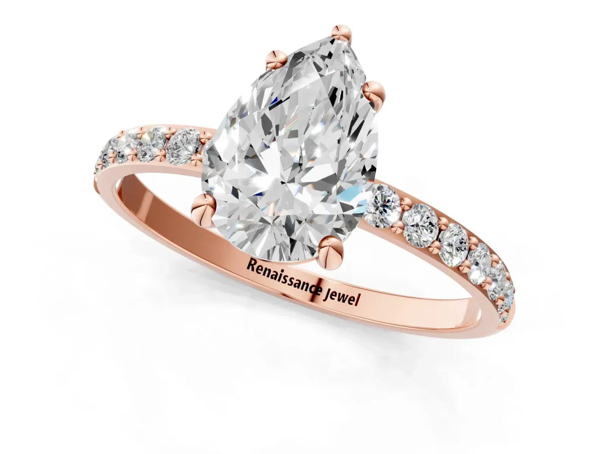 Pear Cut Diamond Solitaire Ring with Round Pavé Band and Prong Setting Rose gold
