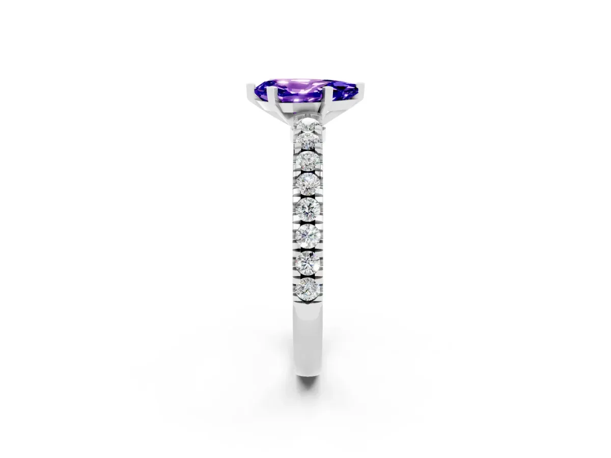 Pear Cut Solitaire Tanzanite with Pavé Band and Four-Prong Setting Silver