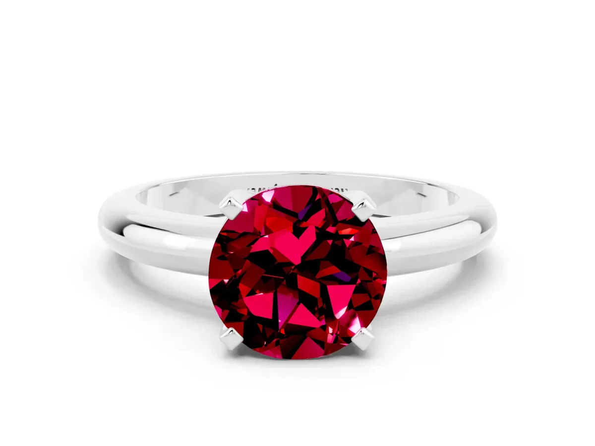 Round Cut Garnet Solitaire Engagement Ring with Round Band and Four-Prong Setting Silver