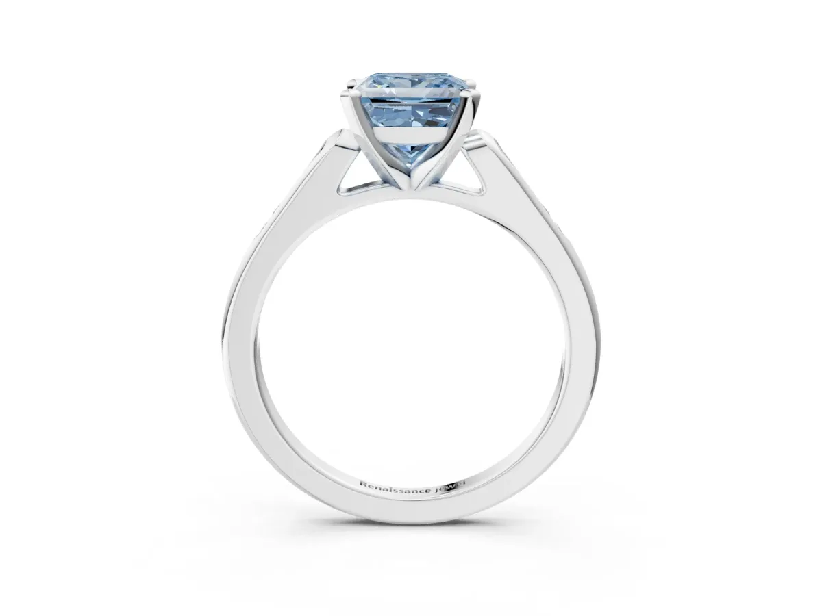 Fancy Blue Princess Cut Diamond Solitaire Ring with Channel Set Round Band and Prong Setting Silver