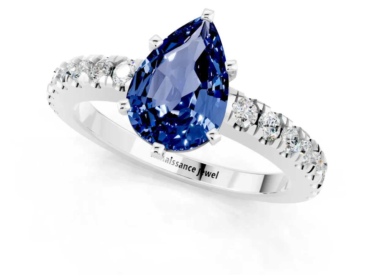 Pear Cut Solitaire Blue Sapphire with Pavé Band and Four-Prong Setting Platinum