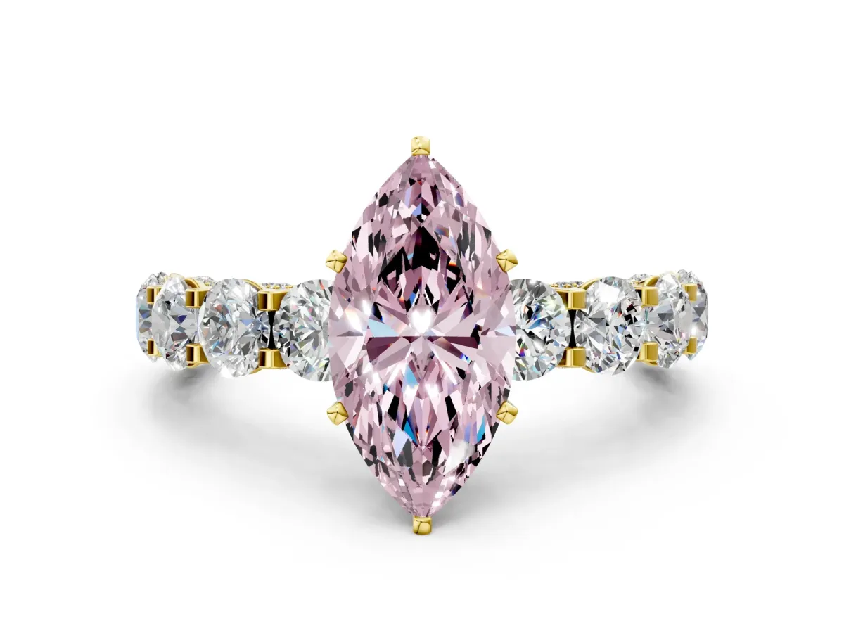 Fancy Pink Marquise Cut Diamond Side Stone Engagement Ring with Four-Prong Setting Yellow gold