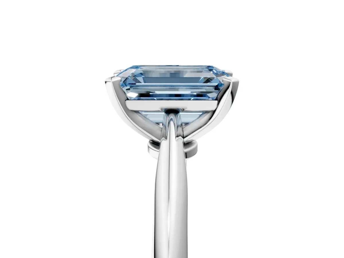 Fancy Blue Emerald Cut Diamond Solitaire Engagement Ring with Classic Band and Four-Prong Setting Silver
