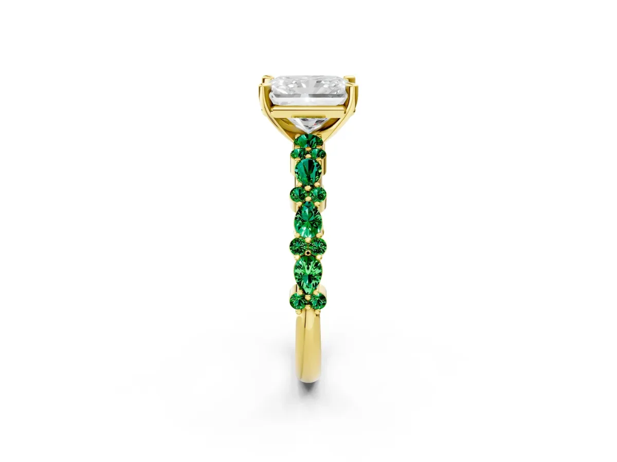 Radiant Cut Diamond Side Stone Solitaire Ring with Round Emerald and Four-Prong Setting Yellow gold