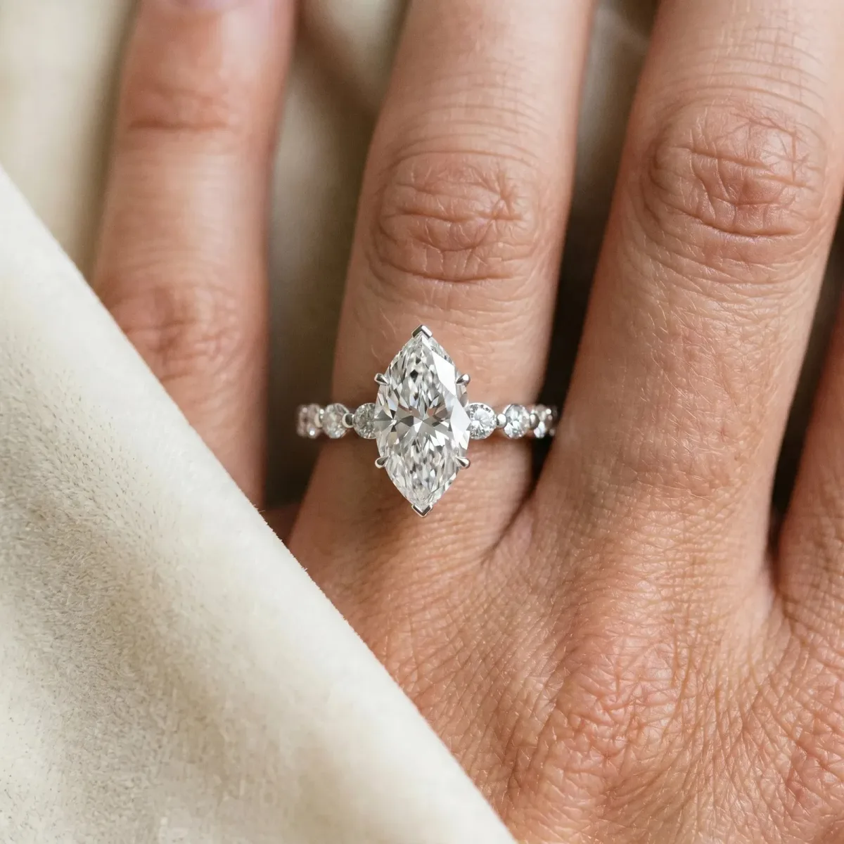 Marquise Cut Solitaire Diamond Ring with Pave Band and Four-Prong Setting Silver