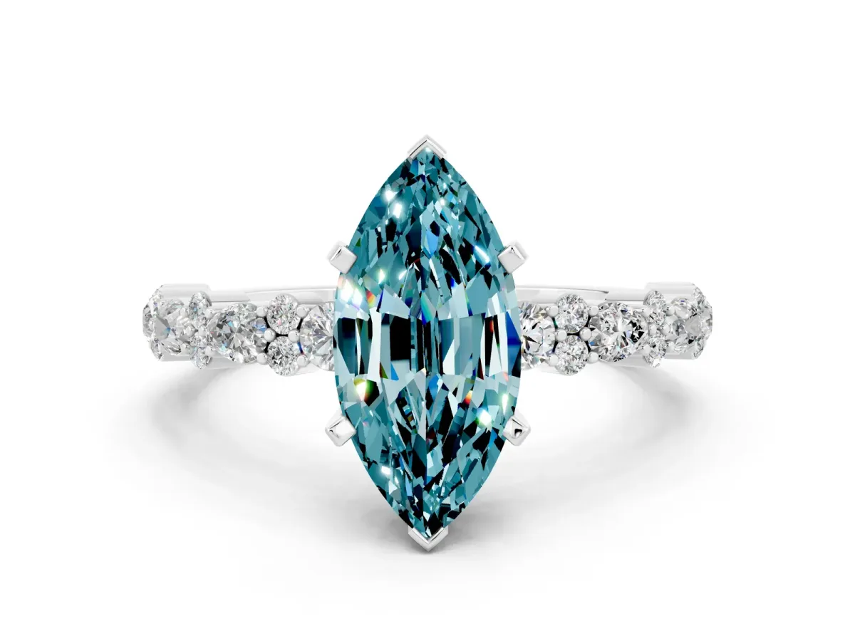 Marquise Cut Blue Topaz Side Stone Solitaire Ring with Round and Four-Prong Setting Silver