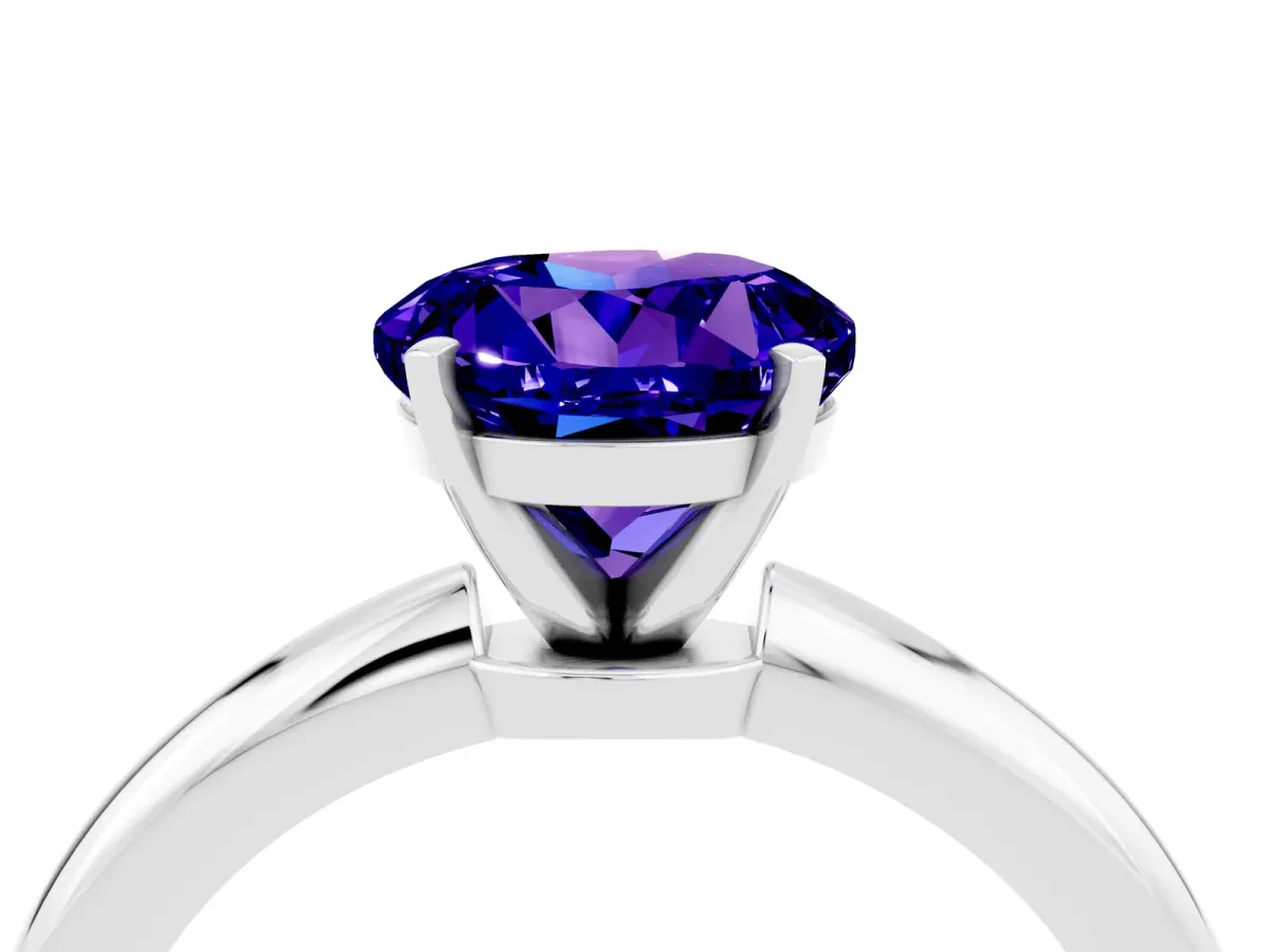 Round Cut Tanzanite Solitaire Ring with Six-Prong Setting and Classic Band Silver