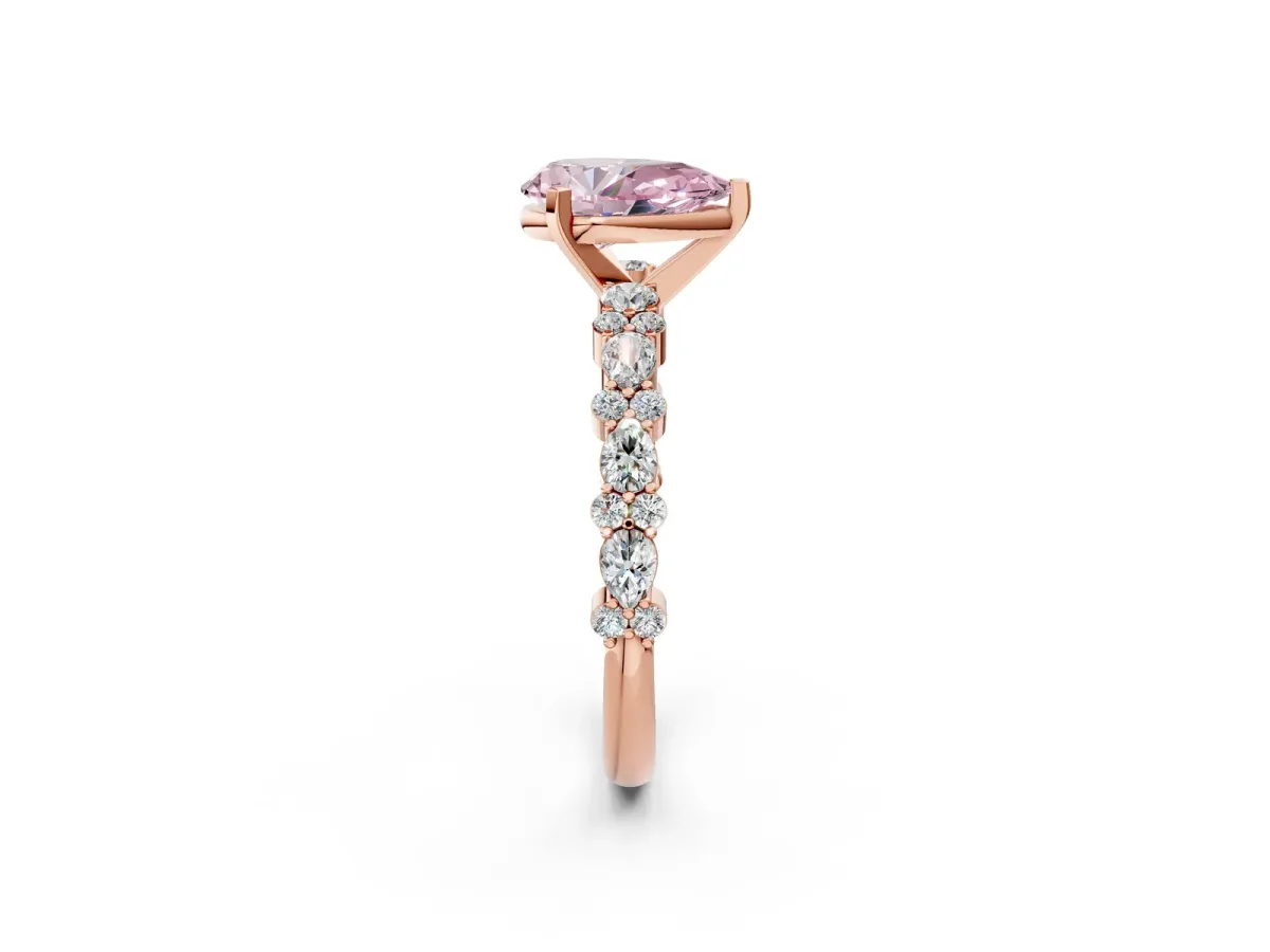 Fancy Pink Pear Cut Diamond Side Stone Solitaire Ring with Round and Four-Prong Setting Rose gold