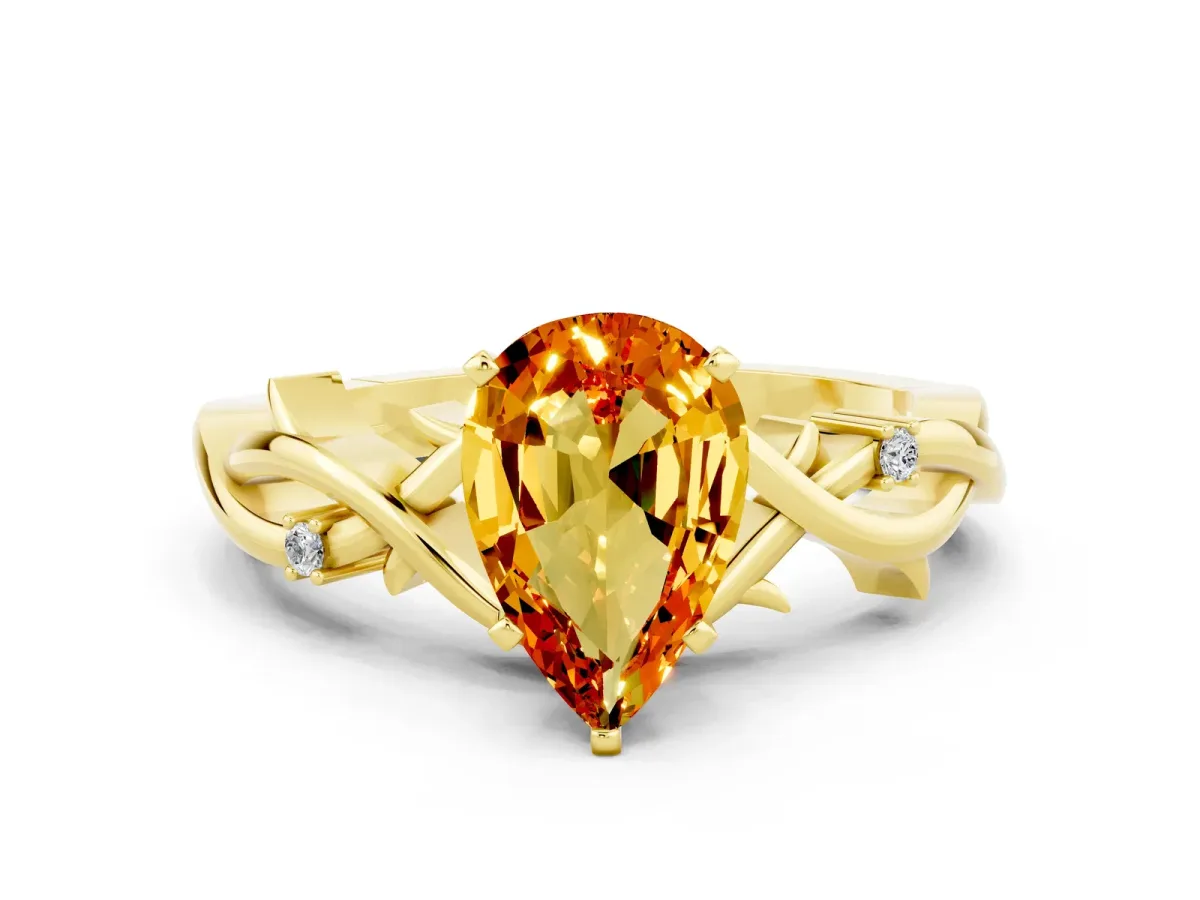 Pear Cut Citrine Solitaire Ring with Twisted Band and Prong Setting Yellow gold