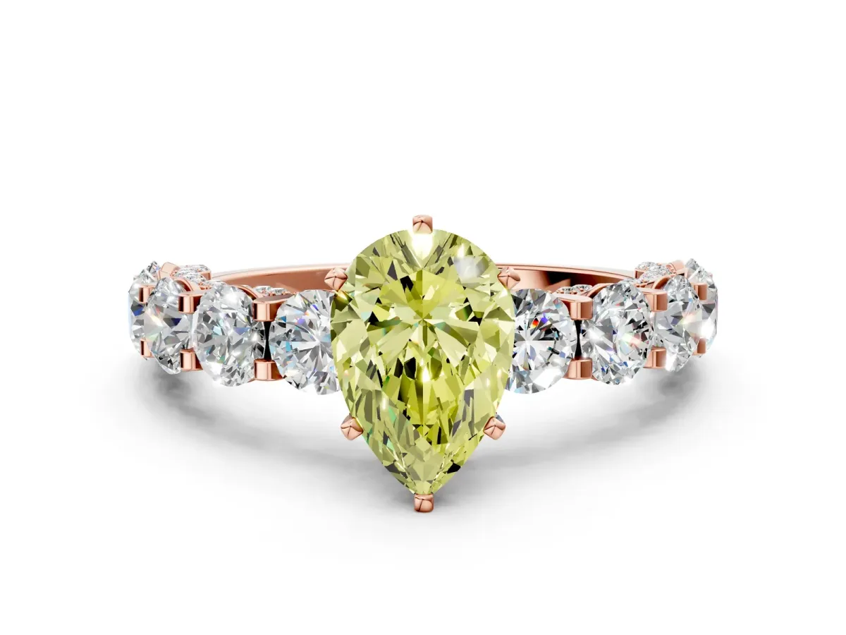 Fancy Yellow Pear Cut Diamond Side Stone Engagement Ring with Four-Prong Setting Rose gold
