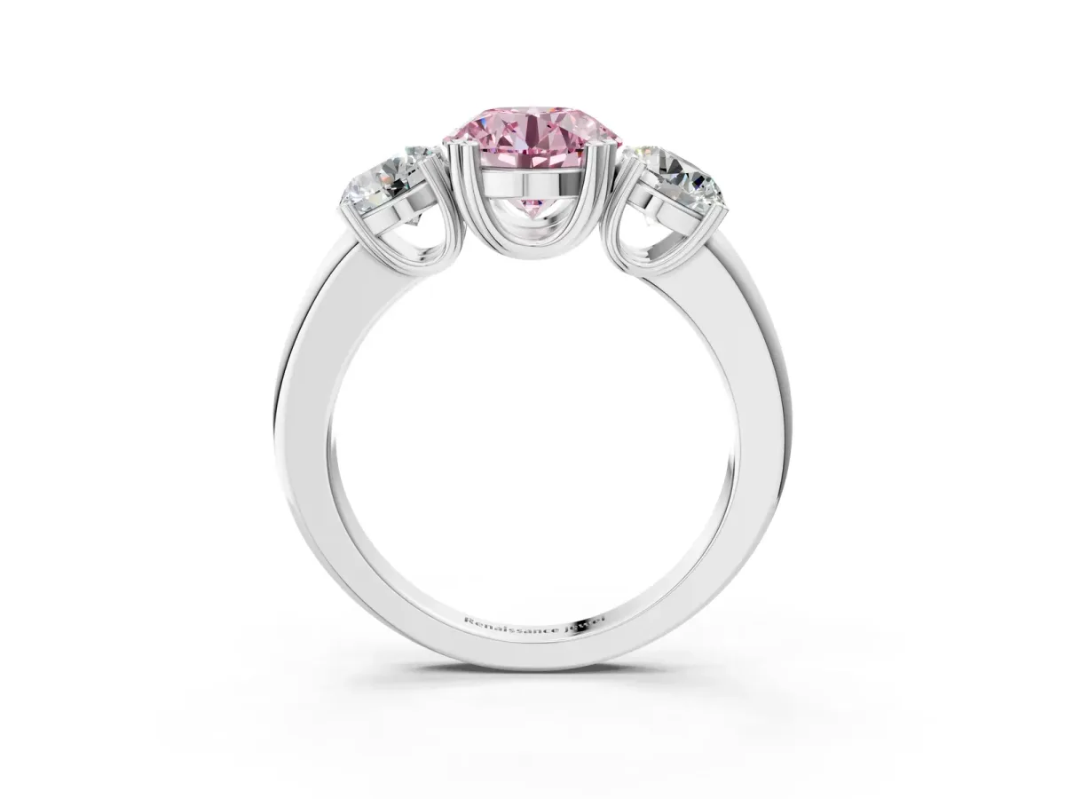 Fancy Pink Three-Stone Round Cut Cut Diamond Ring with Channel Set Band and Four-Prong Setting Silver