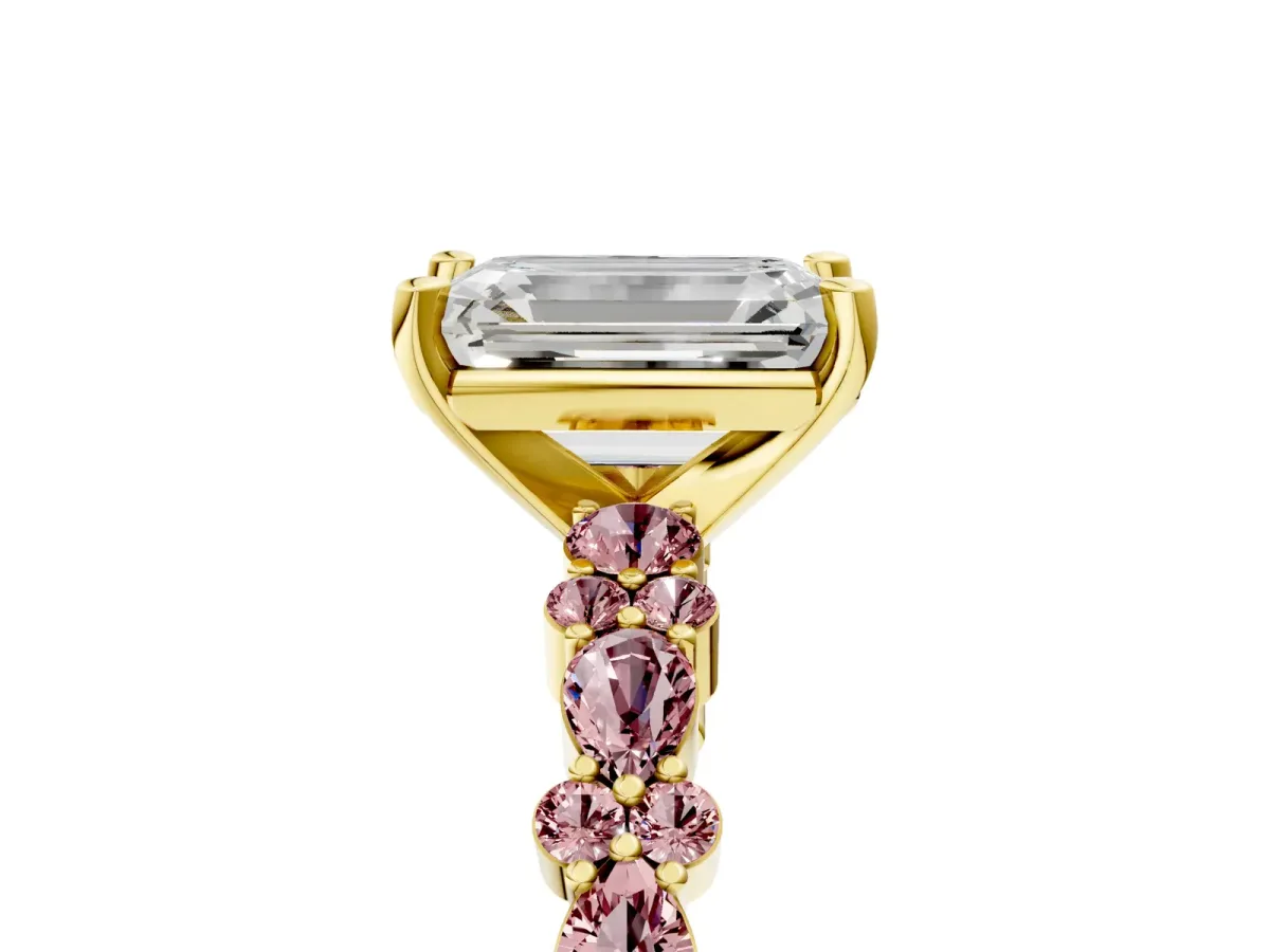 Emerald Cut Diamond Side Stone Solitaire Ring with Round Morganite and Four-Prong Setting Yellow gold