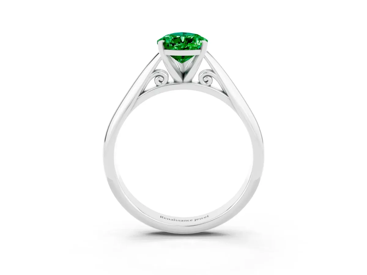 Pear Cut Emerald Solitaire Engagement Ring with Cathedral Setting and Four-Prong Mount White gold
