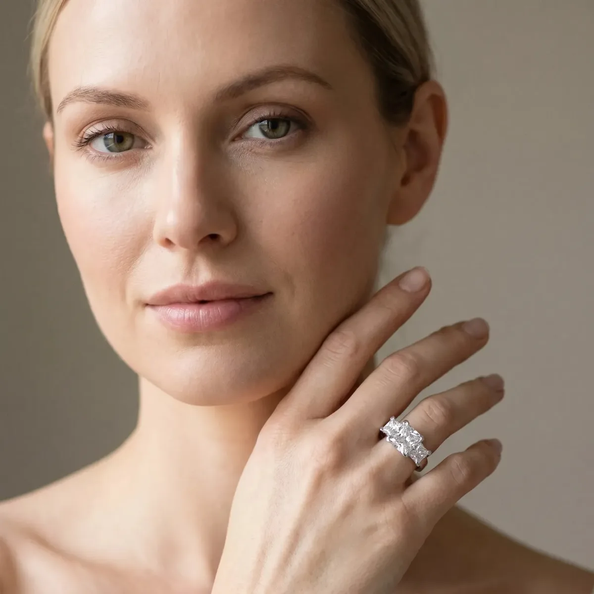 Three-Stone Radiant Cut Cut Diamond Ring with Channel Set Band and Four-Prong Setting Silver