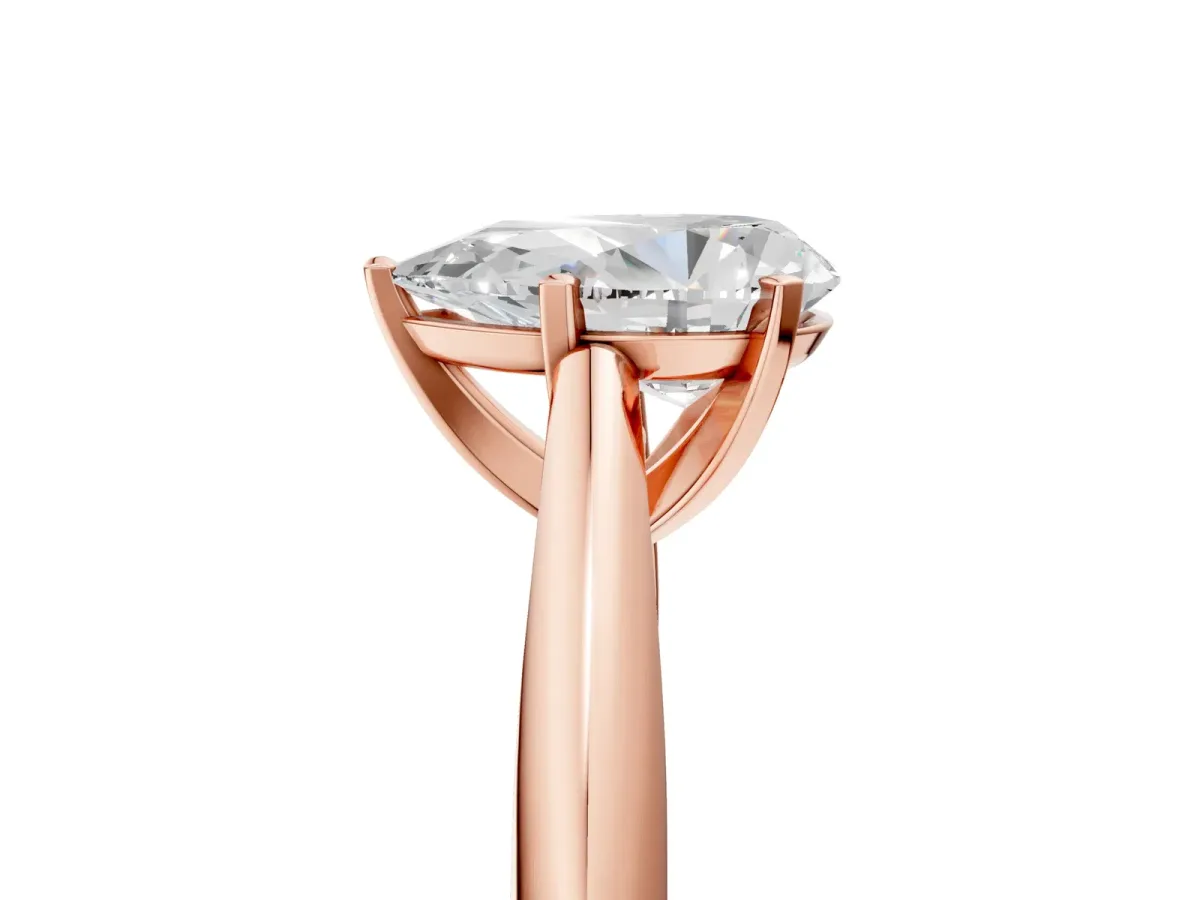 Pear Cut Diamond Solitaire Engagement Ring with Cathedral Setting and Four-Prong Mount Rose gold