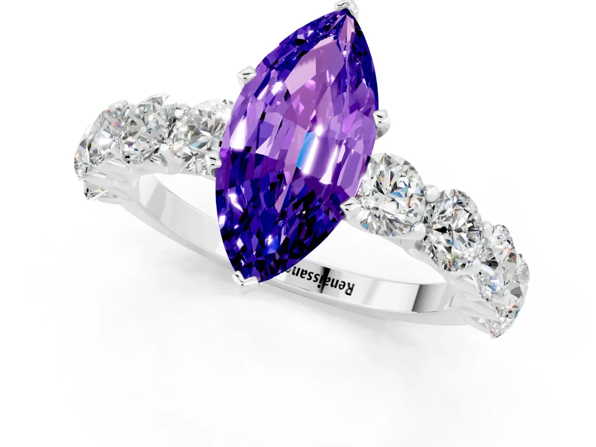 Marquise Cut Tanzanite Prong Setting with Side Stones on a Pave Band Silver