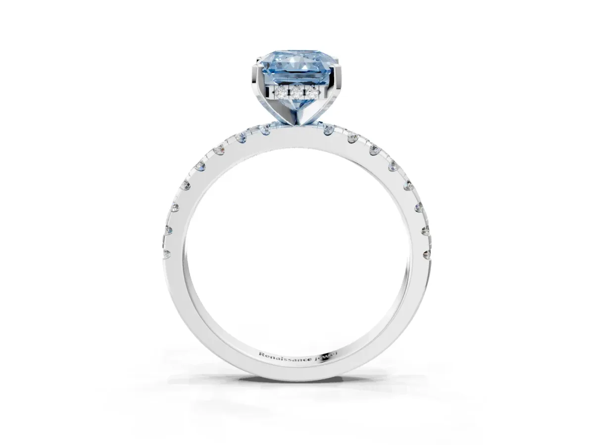 Fancy Blue Radiant Cut Diamond Solitaire Ring with Round Pavé Band and Four-Prong Setting Silver